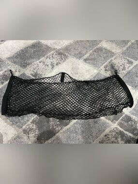 Kia trunk cargo net measured at approximately 33 inches wide